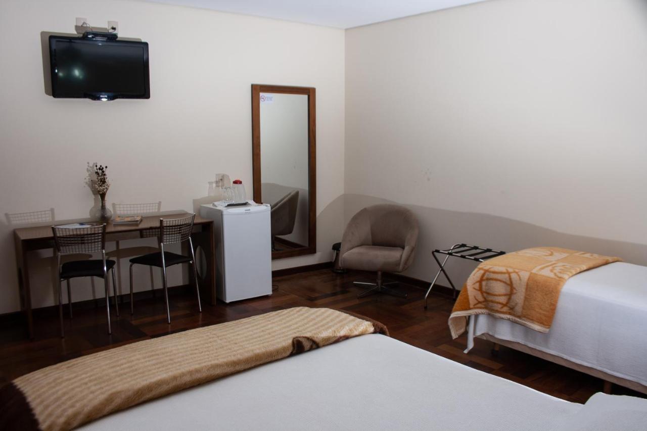 Apart Hotel Agua Limpa Prados Luaran gambar